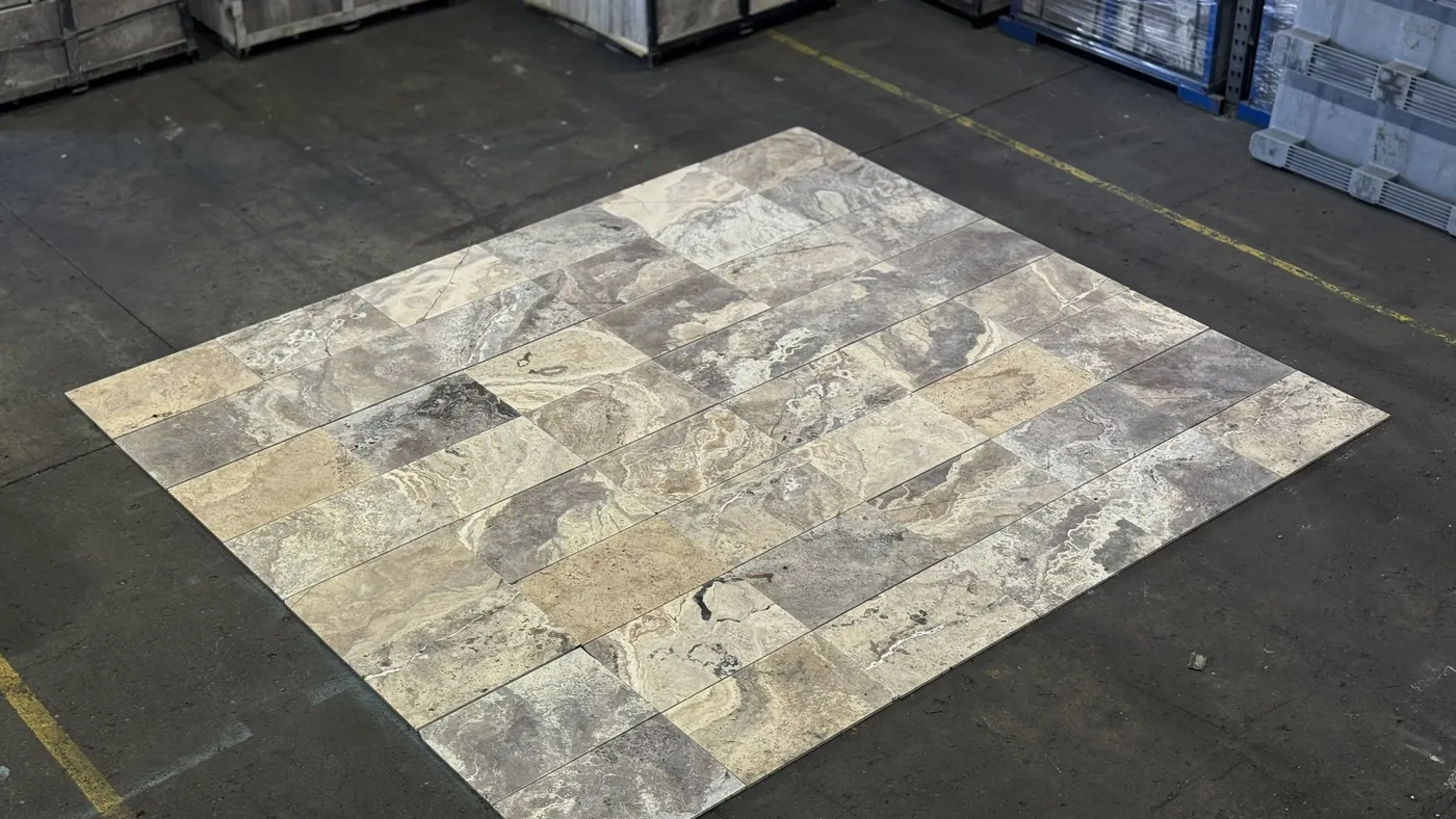 Natural stone pavers laid out on a floor