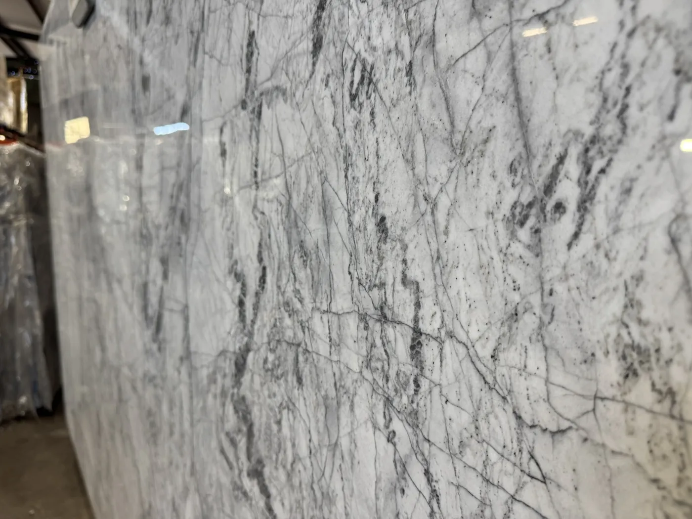 White slab with soft grey linear veining